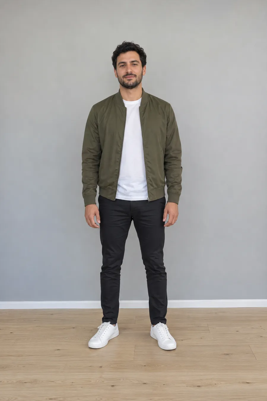 Man standing in a bright hallway, example input photo